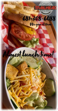 Picture of a hamburger and salad at Trailhead Bar and Grill