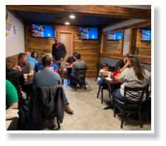 Dining room with people eating at Trailhead Bar and Grill